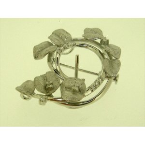 Photo: K18WG DIA BROOCH